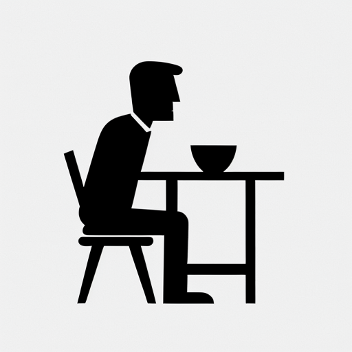pictogram of a man sitting at a table