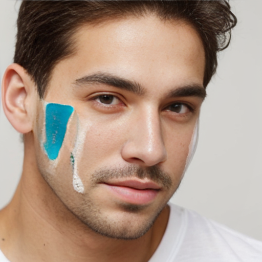 short white guy with a mole on his face

